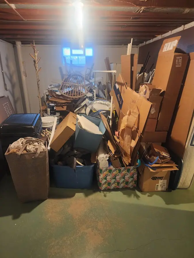 Roll-off dumpster container at job site for 20 Yard Dumpster Rental in Newport